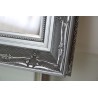 Miroir dans un cadre argenté orné - 8001001